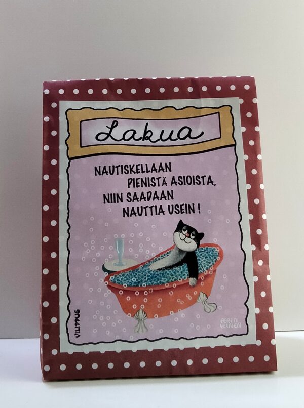 Lakupussi, jossa on teksti: "Nautiskellaan pienistä asioista, niin saadaan nauttia usein!"